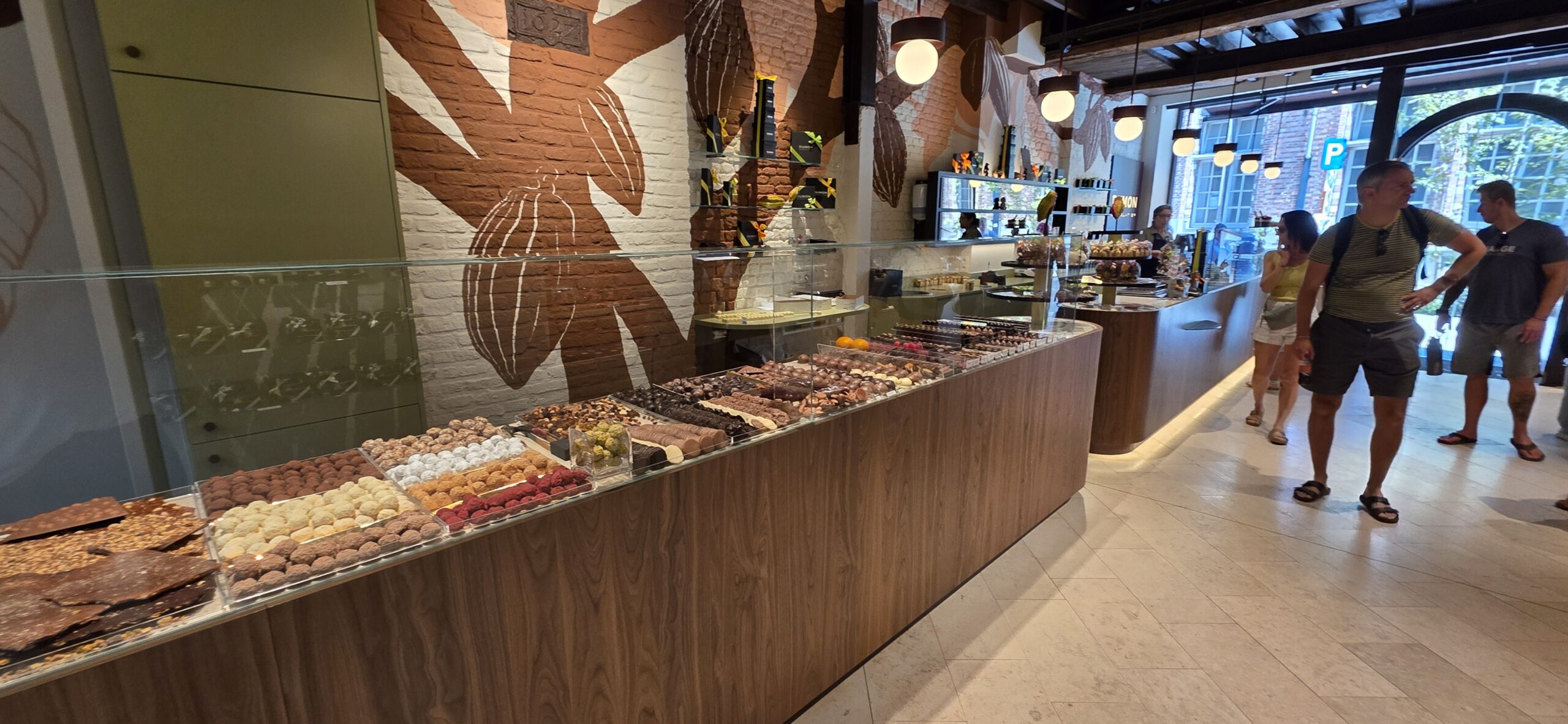 Interior of a Belgian chocolate shop in Bruges with sweets on display